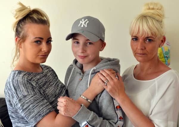 Cancer sufferer Josie King with her sister Jessica King and mother Donna Doneathy.