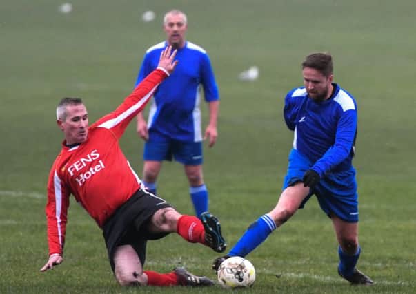 Oddfellows Arms (blue) battle against Hartlepool Vets last week. Pictures by Kevin Brady