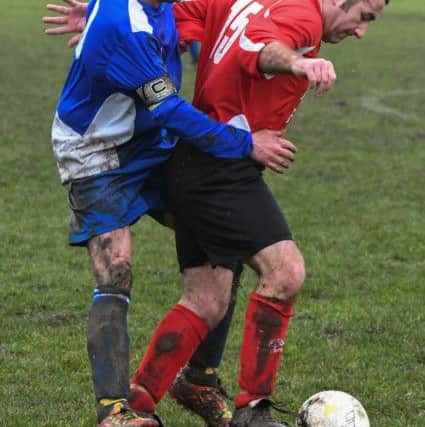 Oddfellows fight for the ball at Hartlepool Vets