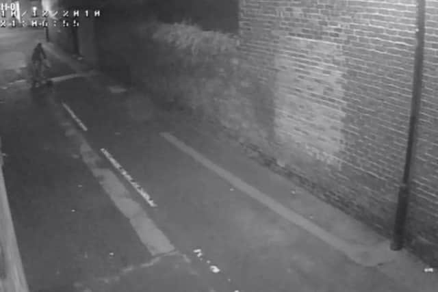 Brand is captured on CCTV in a nearby street on his bicycle.
