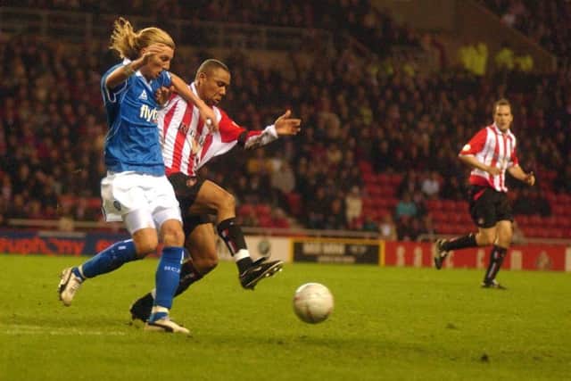 Sunderland's Jeff Whitley takes on Birmingham's Robbie Savage