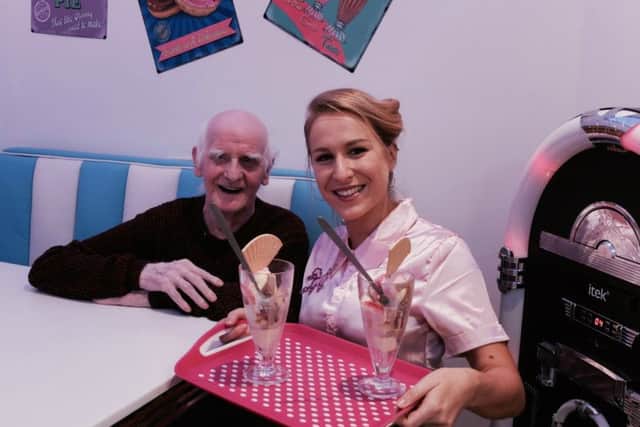 Resident Barry Woodey with staff member Natalie Heffner.