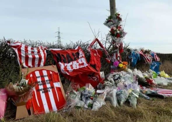 Flowers and Sunderland tops placed at the site where Stuart Price died.