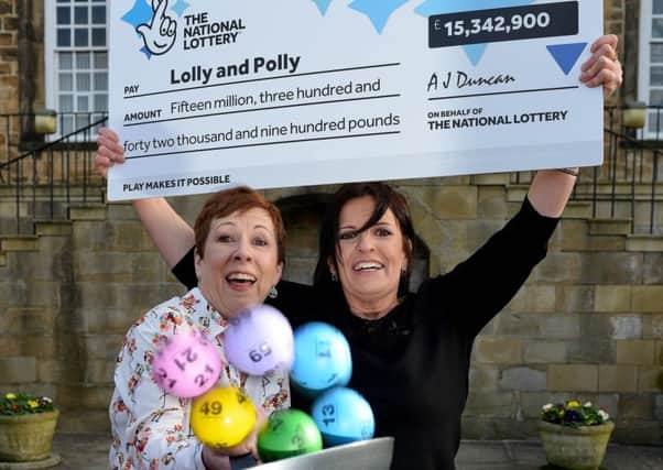 Lottery winners Lorraine Smith (left) and Paula Barraclough who have scooped Â£15,342,900.