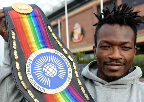 Boxer Thomas Essomba with his Commonwealth title belt. Picture by Frank Reid
