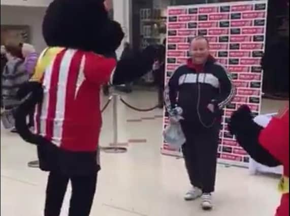 Dave the Rave dances with Sunderland AFC mascots Samson and Delilah. Pic courtesy of SAFC.