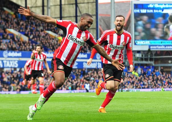 Jermaine Defoe wheels away in celebration after securing Sunderland's 2-0 win over Everton at Goodison Park in 2015. Picture by Frank Reid