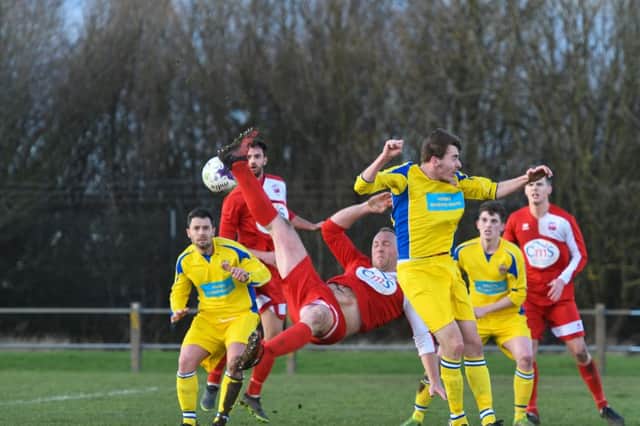 Washington (red) battle against Chester-le-Street on Saturday. Picture by Kevin Brady