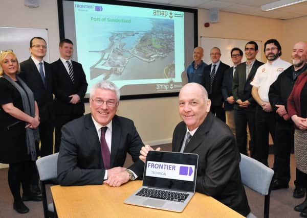 Trevor Hardcastle (front left) with Sunderland city council leader Coun Paul Watson and representatives of consortium members.