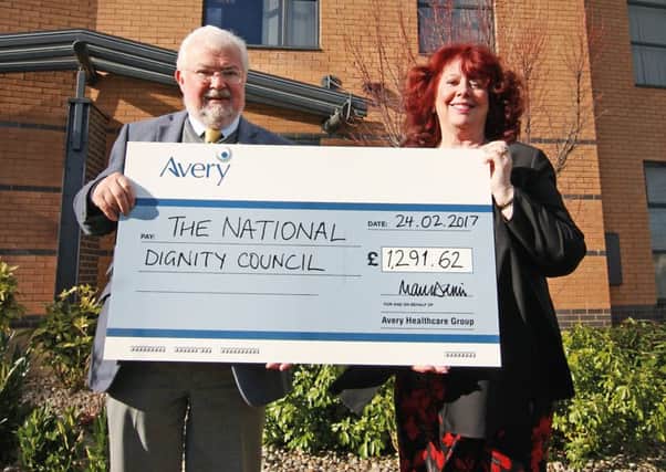 With the cheque are Ian Matthews, co-founder of Avery Healthcare, and Jan Burns, chairwoman of National Dignity Council.