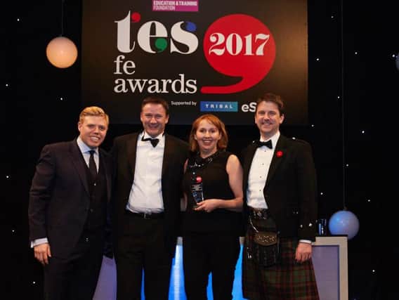 - Second right, Dr Lindsey Whiterod OBE, Chief Executive of South Tyneside College, and, second left, Chair of Governors Andrew Watts, collect the FE provider of the year award, with, left, event host and comedian Rob Beckett, and, right, David Russell, Chief Executive of the Education and Training Foundation.