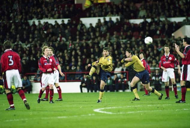 Kevin Phillips tries a cheeky chip in Sunderland's 3-0 win at promotion rivals Nottingham Forest