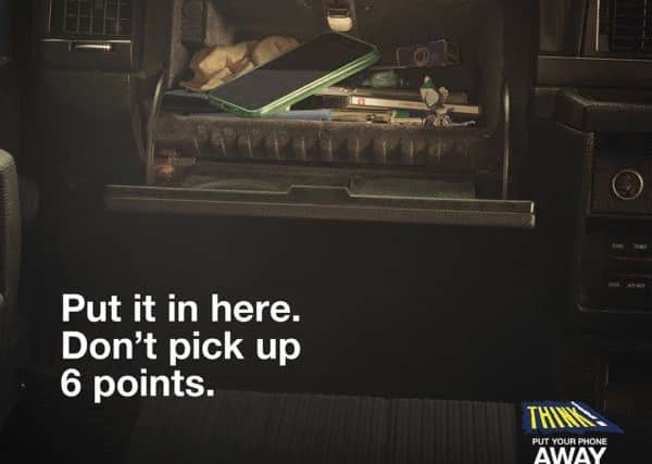 An image from the campaign calling on drivers to not use their phone while behind the wheel.