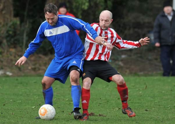 Wearmouth Old Boys (red and white) battle against Ivy Legends last weekend. Picture by Tim Richardson