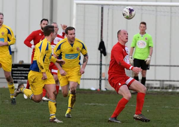 Washington (red) battle against Chester-le-Street in last week's 3-3 Division One draw. Picture by Kevin Brady