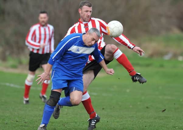 Over-40s League action: Wearmouth Old Boys (stripes) take on Ivy Legends. Picture by Tim Richardson