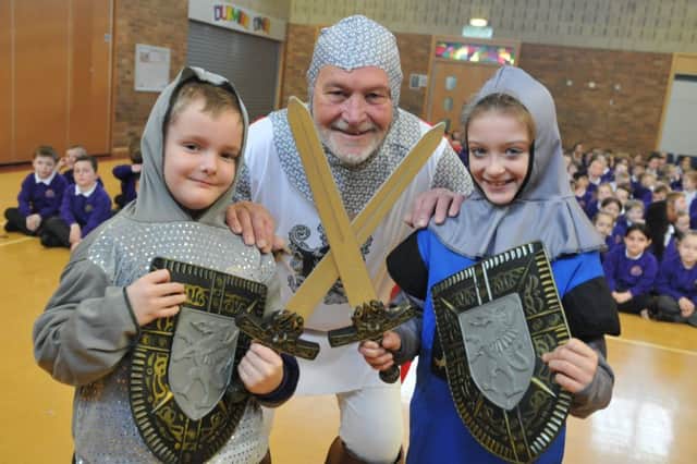 Author Karen Langtree's character Sir Trampsalot with Dubmire Academy pupils Kyra Jarvis and Ashton McKay.