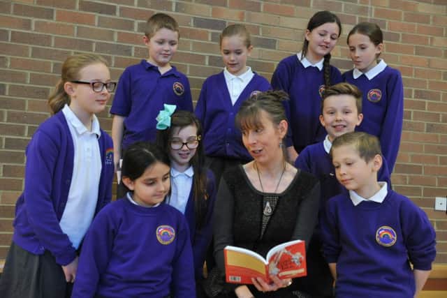 Author Karen Langtree reads to pupils of Dubmire Academy.