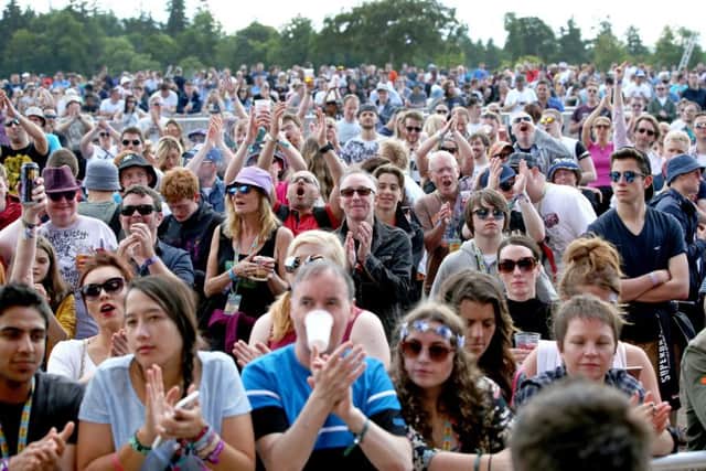 Festivalgoers watch the main stage at T in the Park at Strathallan Castle, Perthshire, last year.