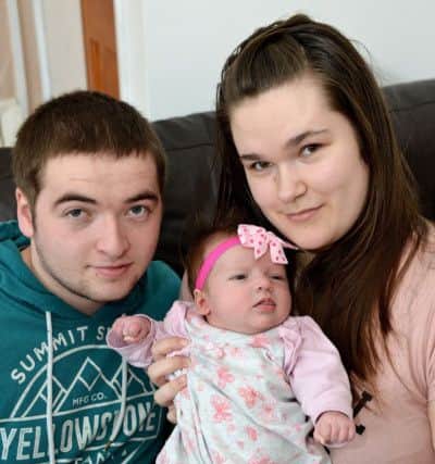 Connor Turnbull and Joy Spowart with their daughter Dana Turnbull, who was born on the same day as both her mum and grandmother.