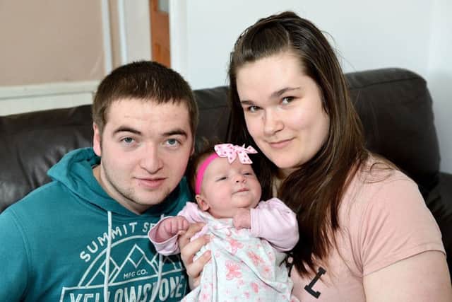 Connor Turnbull and Joy Spowart with their daughter Dana Turnbull, who was born on the same day as both her mum and grandmother.