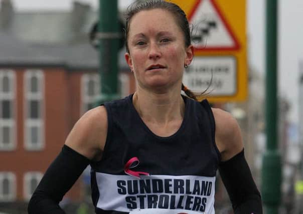 RUN: Runner Alyson Dixon braves the bad weather to take part in the Sunderland 10K and Half Marathon Event Picture: DAVID WOOD