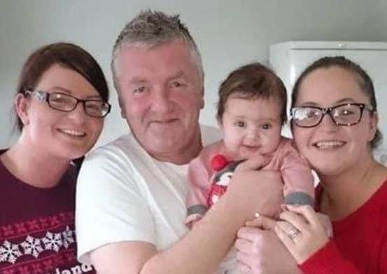 Stewart Anderson, pictured holding granddaughter Neve Allcroft, with daughters Kelly Beston, left and Kay Allcroft.