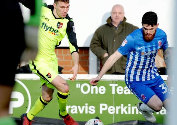 Pools' Liam Donnelly (right) takes on Exeter in last Saturday's vital 3-1 win. Picture by Frank Reid