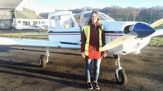Emma Whelan who has gained a pilot's licence.