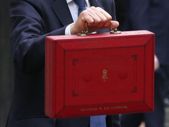 The Budget is carried in the Chancellor's little red suitcase.