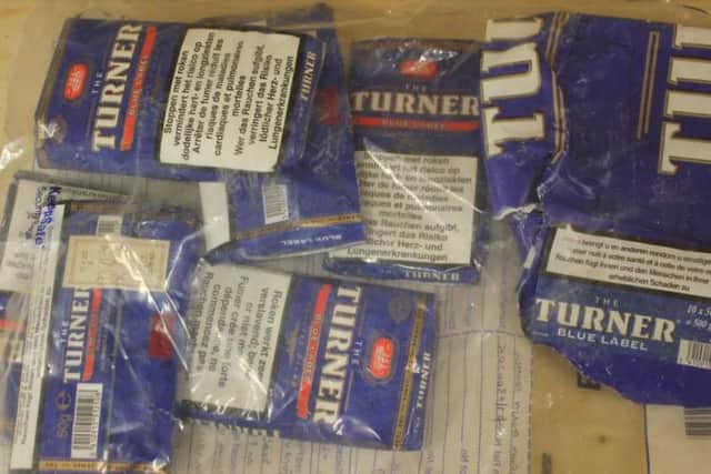 Goods seized in counterfeit cigarette operation.
