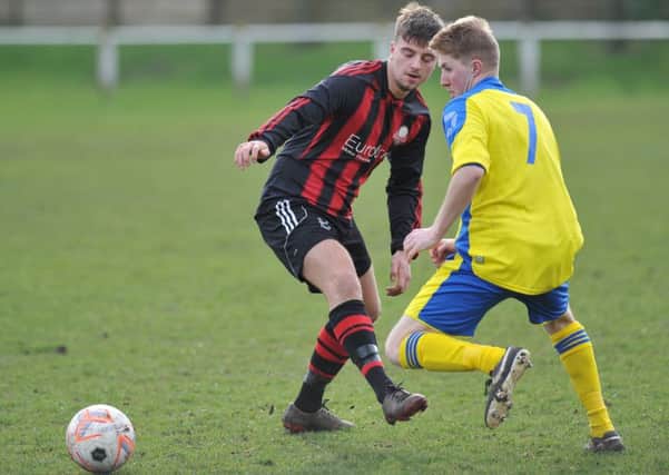 Wearside League action between Ashbrooke Belford (black and red) and Wolviston last weekend. Picture by Kevin Brady