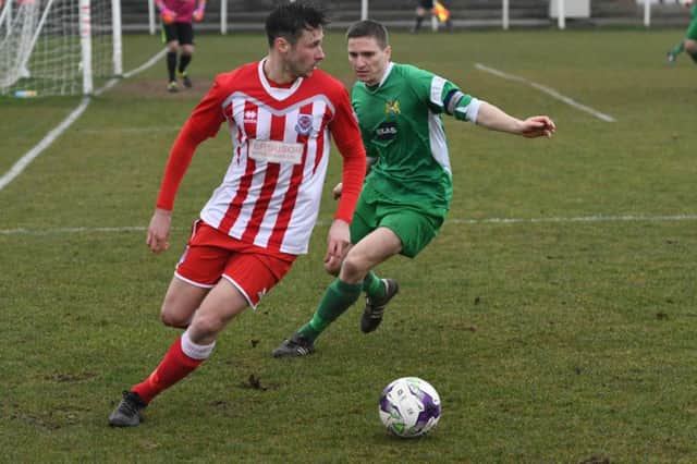 Seaham Red Star (red/white) look to create an opening again Newcastle Benfield on Saturday. Picture by Kevin Brady