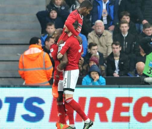 Ryan Sessegnon gets a lift after putting Fulham 3-0 up at Newcastle. Picture by Frank Reid