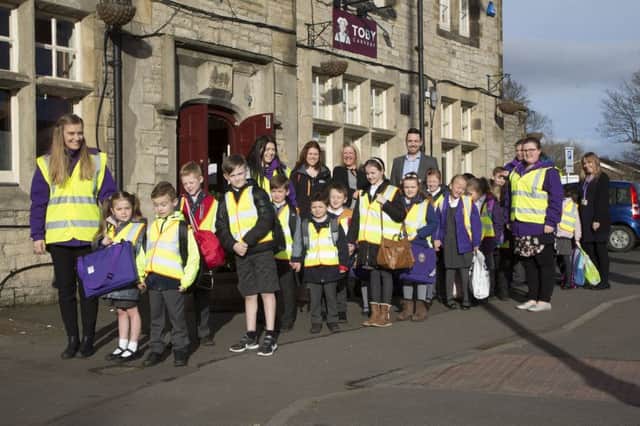 Children from Cleadon Church of England Academy taking part in the 'Walking Bus' initiative.