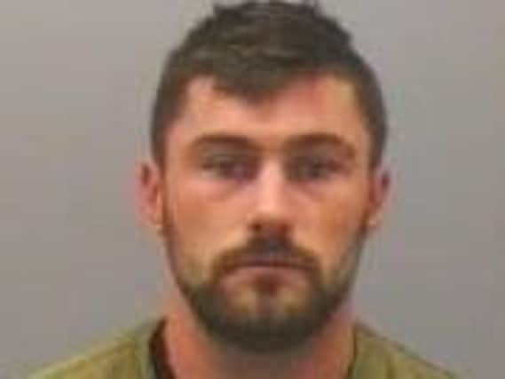 David Izzard was jailed for 16 months for a one-punch attack which left his victim with brain injuries.