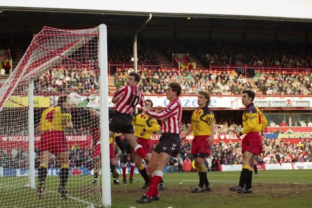 Phil Gray and Richard Ord look on as Craig Russells corner flies straight into the net for the opening goal against Watford in 1994. Pictures by Peter Berry