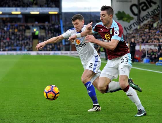 Burnley's Stephen Ward battles against Billy Jones in their 4-1 win over Sunderland on New Year's Eve. Picture by Frank Reid