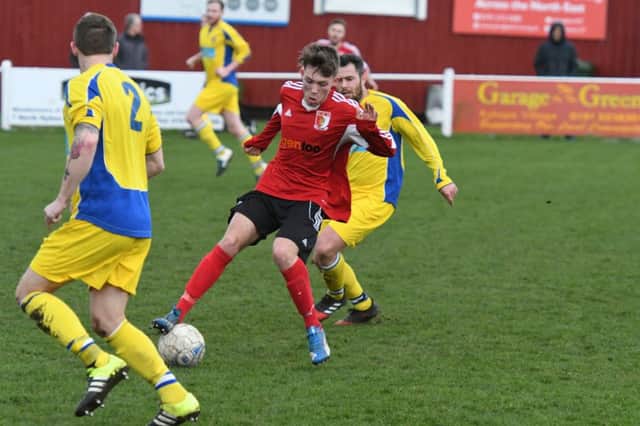 Sunderland RCA (red) battle against Chester-le-Street in a recent clash