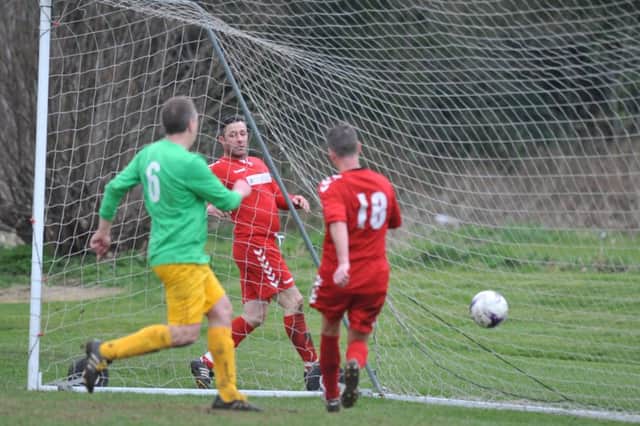 Wearmouth CW (red) score against Consett in the Over-40s Cup clash last week. Picture by Tim Richardson