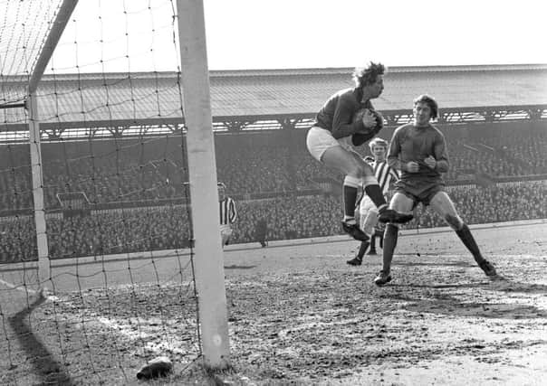 Jimmy Montgomery gathers a cross under pressure against Newcastle in 1970