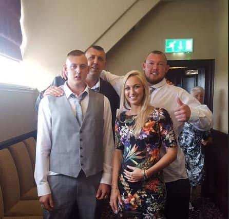 From left: Lee Downey with his siblings, from left: Chad, Lee, Jodie and Scott.