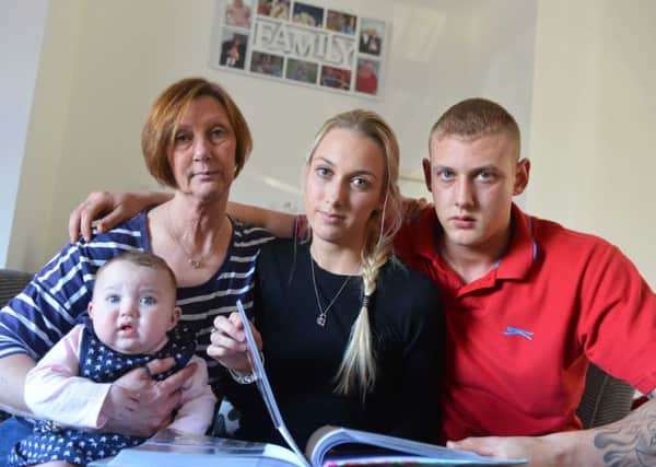 Family of Lee Downey. From left mother Lynn Metcalf, granddaughter Ruby Metcalf aged 4 months, sister Jodie Metcalf and younger brother Chad Metcalf.