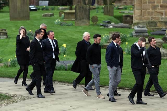 Mourners arrive at Durham Cathedral for the service.