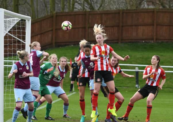 Sunderland's Hayley Sharp goes up for a header from a corner