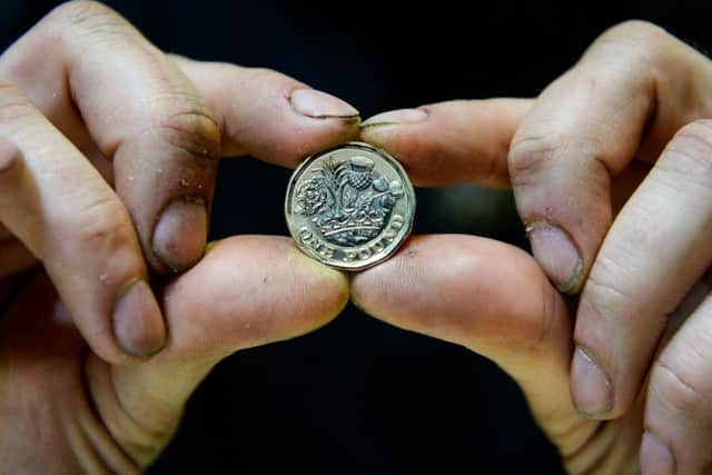 The new 1 coin is being produced at the Royal Mint in Llantrisant, South Wales.