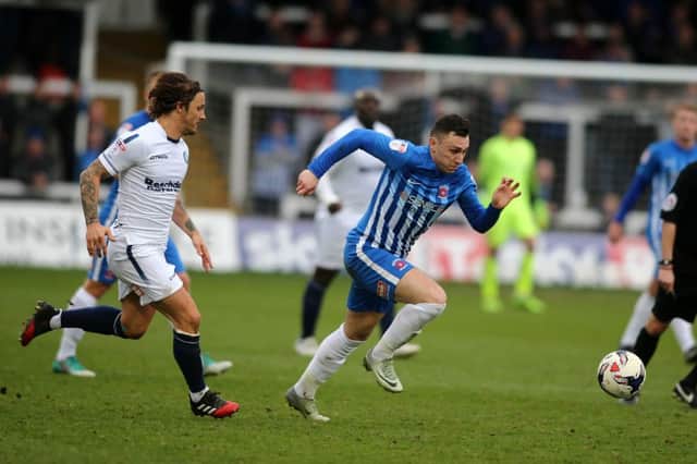 Pools' Nathan Thomas goes on the run against Wycombe. Picture by Tom Banks