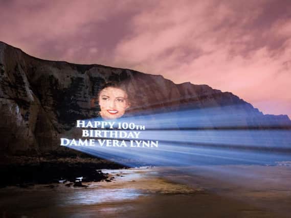 Dame Vera Lynn's image was projected onto the white cliffs of Dover to celebrate her 100th birthday. Pic: PA.