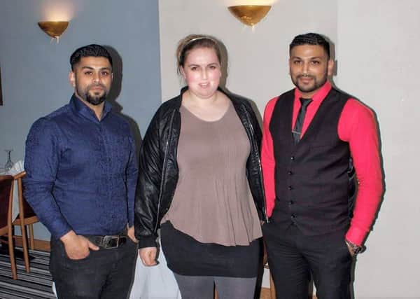 Mo Ahmed and brother Murshed with Sarah Tough at Veer restaurant. Photo by Ashley Foster.