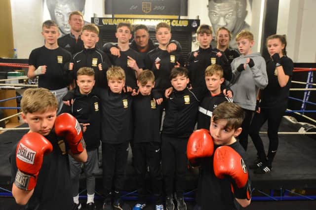 Wearmouth Boxing Club coach Anth Kelly, back centre, with some youngsters who attend the gym and could one day become champions
